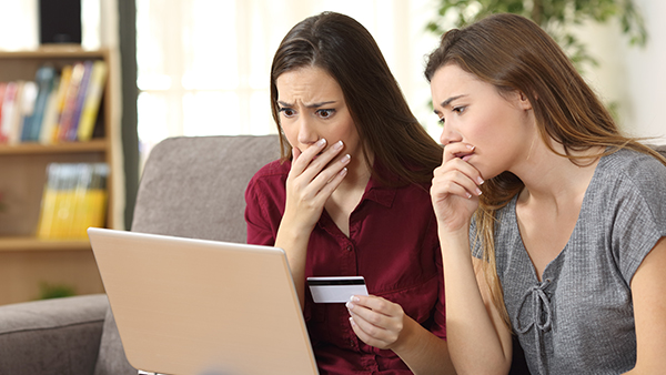 Worried friends buying on line with credit card